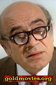 Gianfilippo Carcano come il portinaio della casa di Andrea