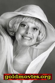 Carol Channing come Muzzy Van Hossmere
