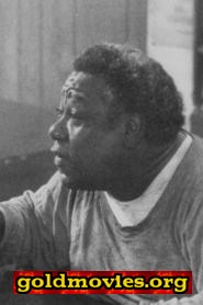 Chino 'Fats' Williams come Bar Patron