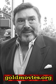 Joseph Mascolo come Gus Mascola