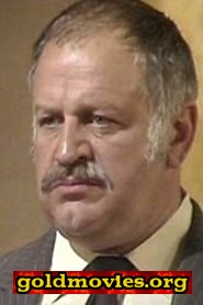 Godfrey James come Head Villager