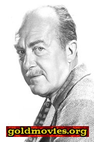Stanley Logan come Colonel Tubbs-Brown