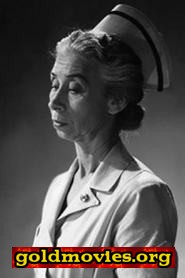 Virginia Farmer come Aunt Clara Caine