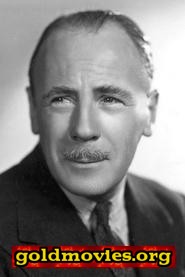 Roland Young come Cosmo Topper
