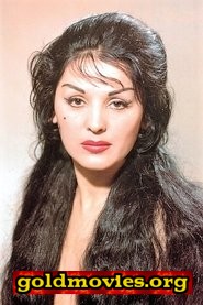 Moira Orfei come Signora Fiore