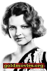 Lilian Bond come Mrs. Timmons
