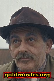 John Glyn-Jones come Bank Manager