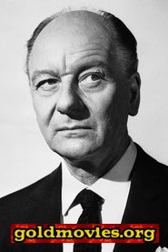 John Gielgud come Brigadier Tomlinson