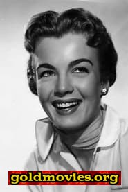 Joanna Barnes come Gloria Upson