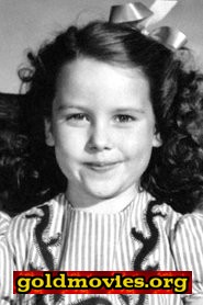 Sharyn Moffett come Joan Blandings