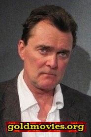 Stuart Milligan come Marksman