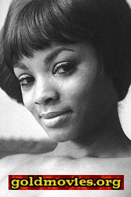 Elaine Collins come Go-Go Dancer